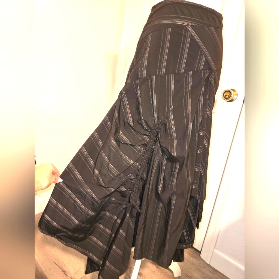 Sun Light Gray Shade. Not Stretchable , Asimetrical Skirt. Size 4